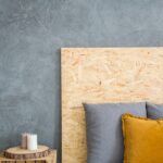 wooden-headboard-and-grey-wall-PMDBEY3